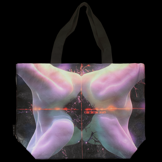 Tote bag with abstract alien design featuring pink and green colors on a black background